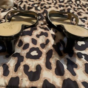 Black patent sling heels